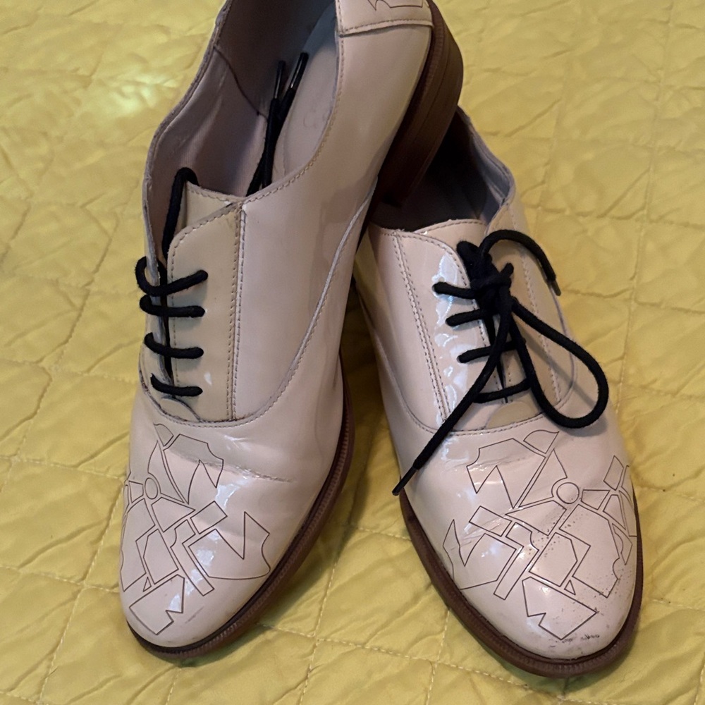 Clarks Cream Lace-Up Flats with Black Detailing